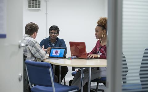 Students in a business meeting