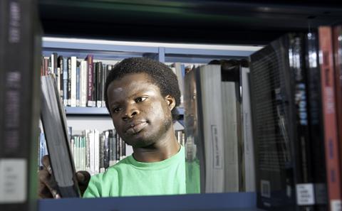 An alumnus using the library