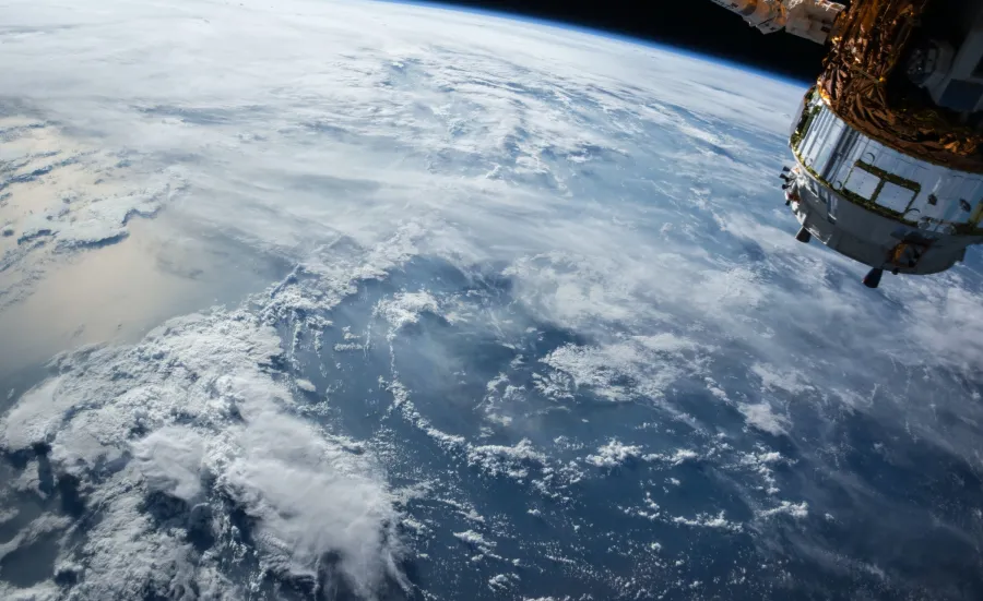 View of Earth from space as a satellite passes out of shot
