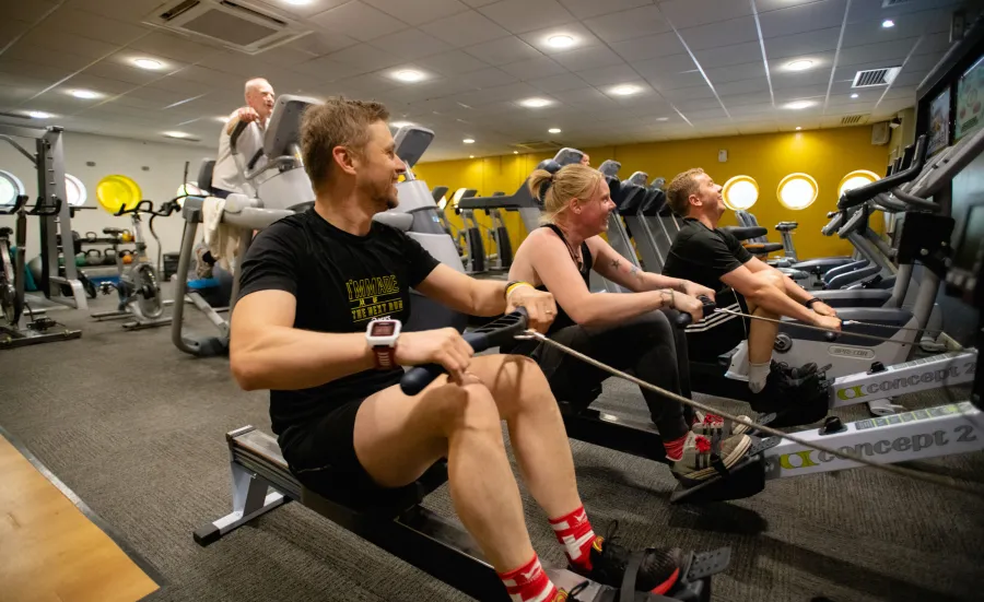 Gym user rowing