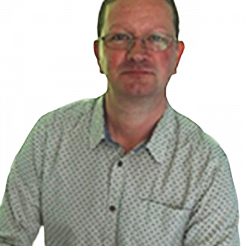 A head and shoulders image of Craig Webber, who wears a shirt and has glasses