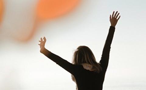 Image of student standing in field