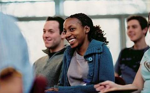 Student smiling in a lecture