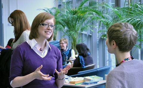 People discussing at a table