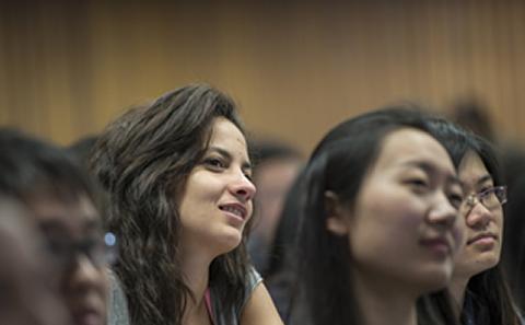 students listening in lecture theatre