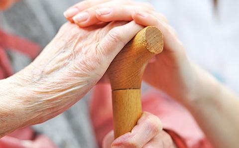 Elderly with cane