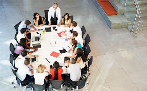 group of business people around a table