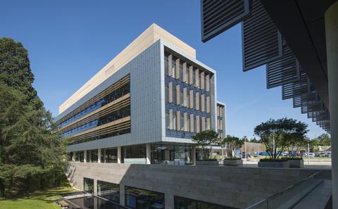 modern white building on bolderwood campus