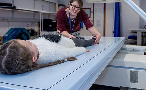 Women being looked after by nurses