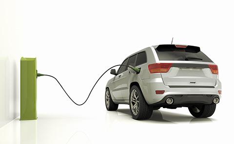 Electric car connected to a charger