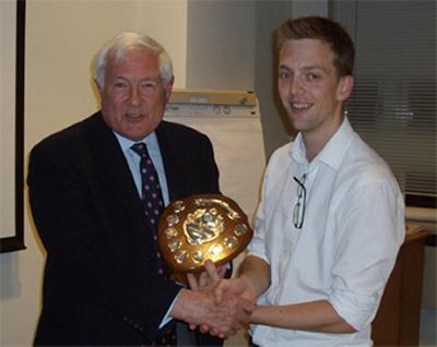 Richard Fox presenting Mike with his award