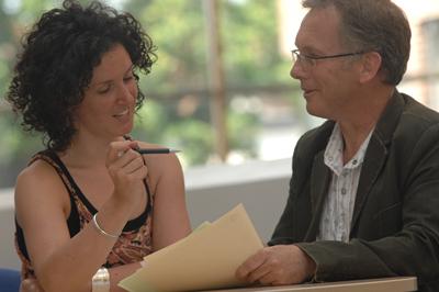 Lecturer and student having a discussion