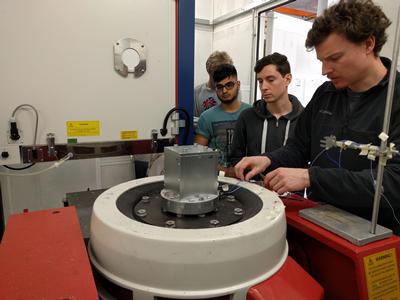 Clemens Rumpf and students with satellite