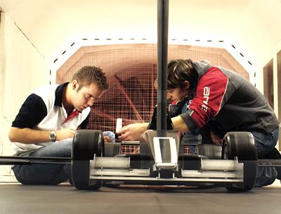 Students working on a car project