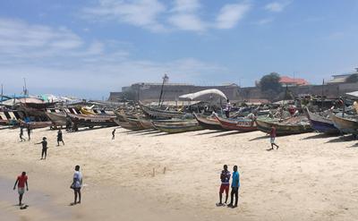 People on beach in Ghana.