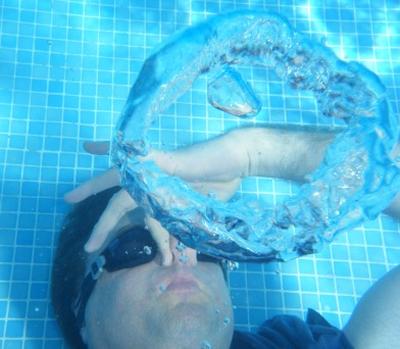 Blowing bubble rings