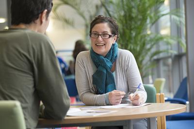 Student and tutor chatting