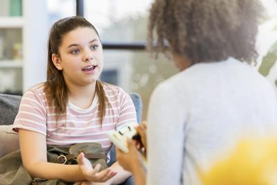 A mentor and student chatting 