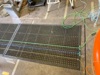 Optical Fibres Laid on a Rubber Mat