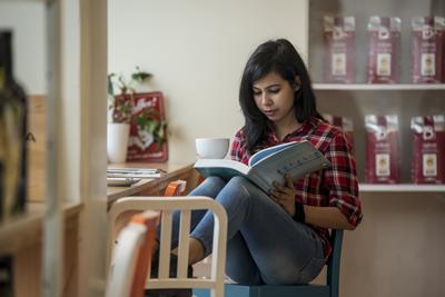 Student relaxing in a cafe