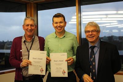 Ben Hume receives his prize