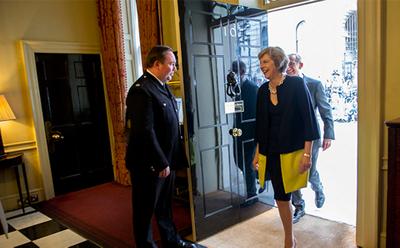 Theresa May arrives at No10