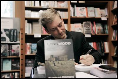 Thomas Brown with his book Lynnwood