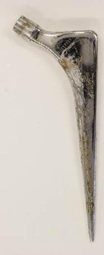 Image of the Damage to a Metal femoral stem Caused by Motion at The Cement Stem Interface 