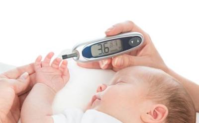 Baby with thermometer