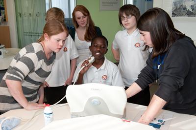 School students in a LifeLab session learning how to take snapshots of human health