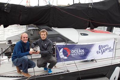 Max and Nicolas, with a prototype of our sensor aboard the boat.