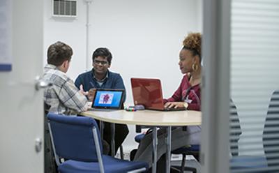 Students at table studying