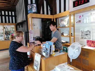 A student volunteering at Tudor House Museum