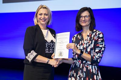 Dr Miriam Santer accepting the prize on behalf of the team from Professor Helen Stokes-Lampard, Chair of the RCGP