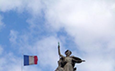 French flag and statue