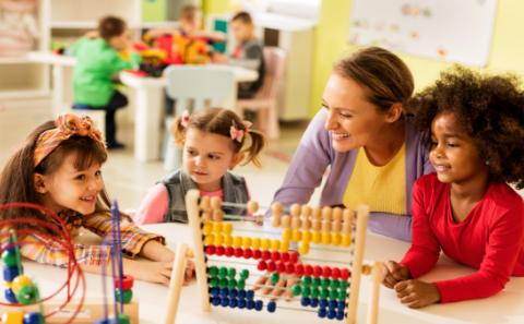 Teacher with children