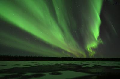 Aurora over river Kitinen, Finland