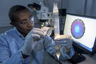 Photocatalytic optical fibres