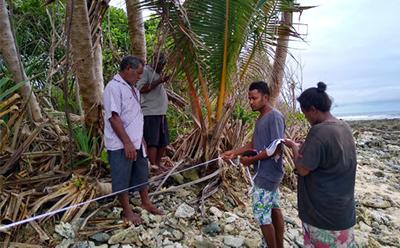 Measuring shoreline Fanalei Island