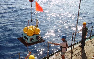 Ocean bottom seismometer being depl