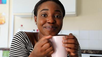 Sarah with a cup of tea