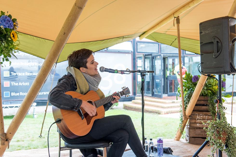 Staff playing Kitty O’Neal performing on Tipi Stage