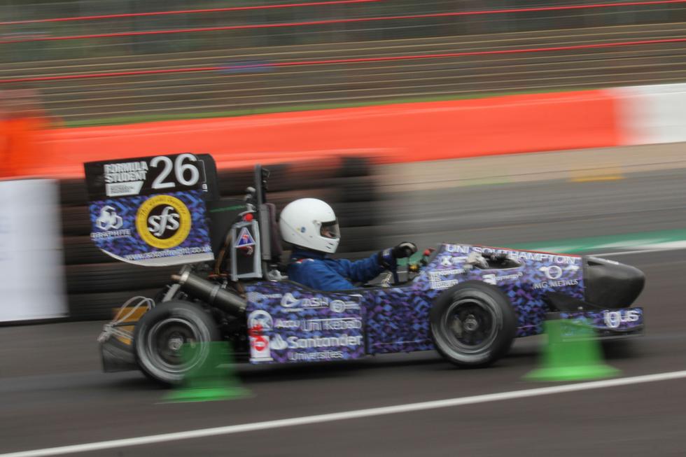 Race car speeding on the track
