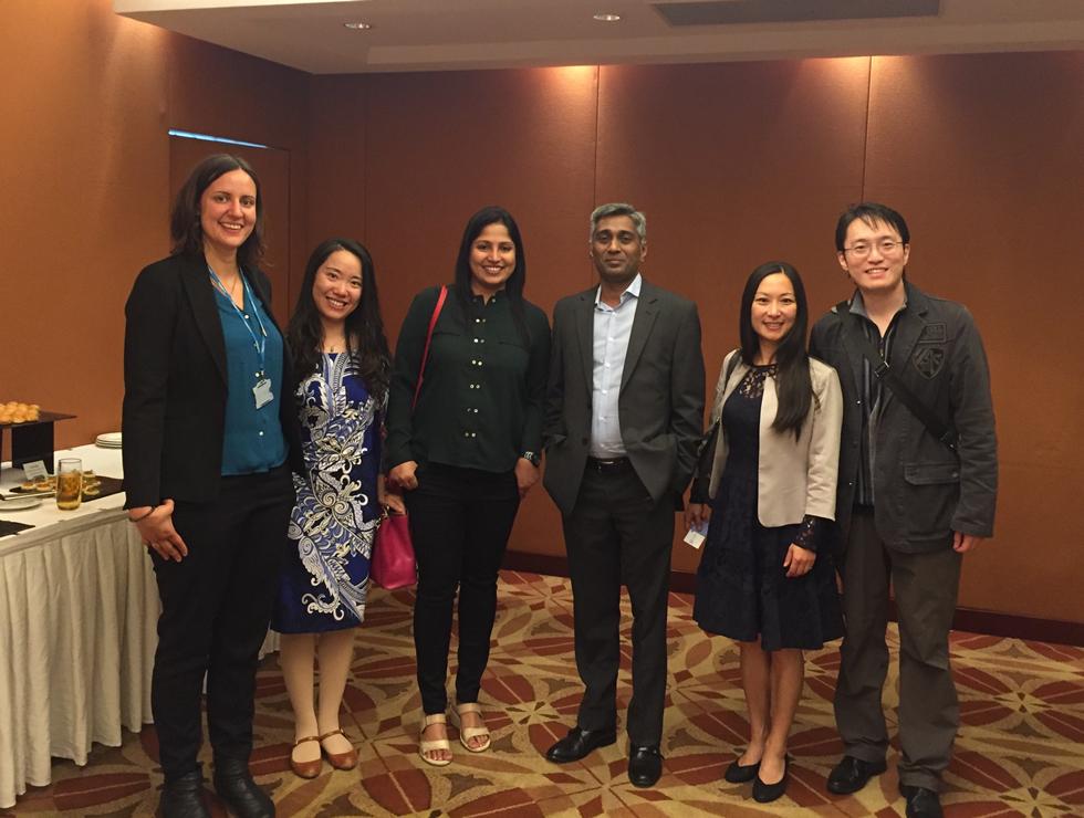 Song and Miriam pose for photo with alumni