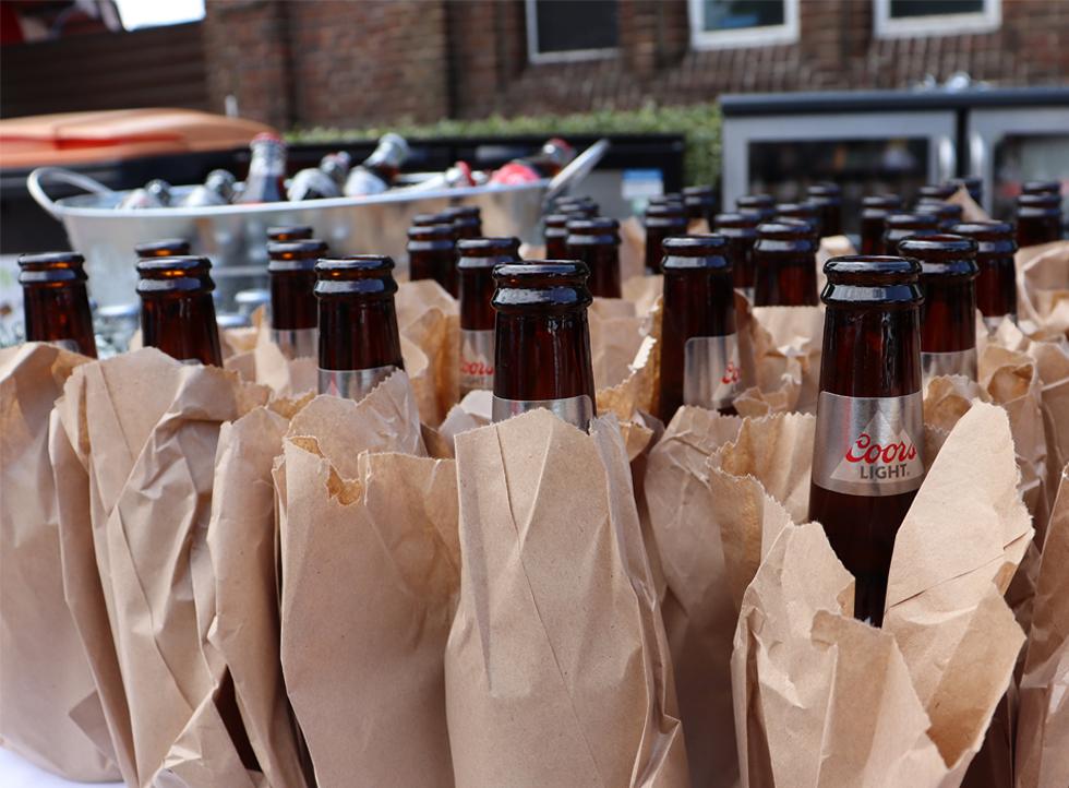 Beer bottles in vintage brown bags
