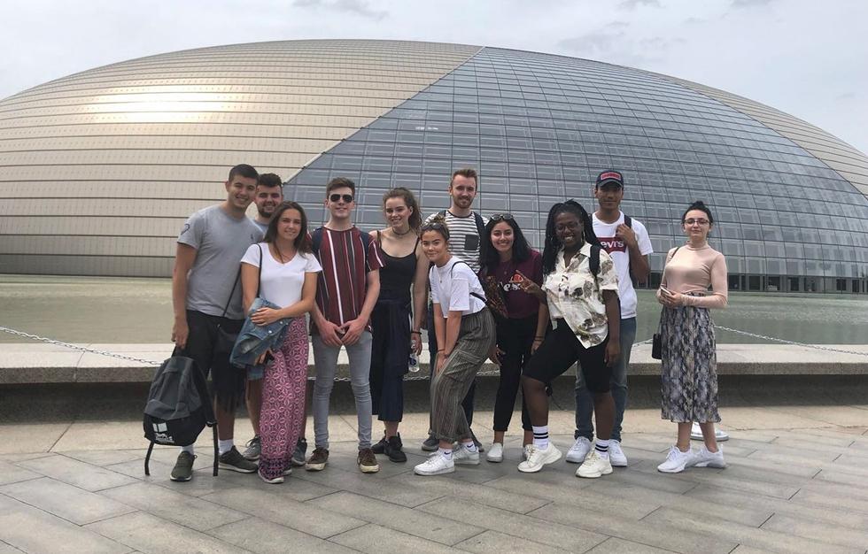 Students posing for group photo during day trip