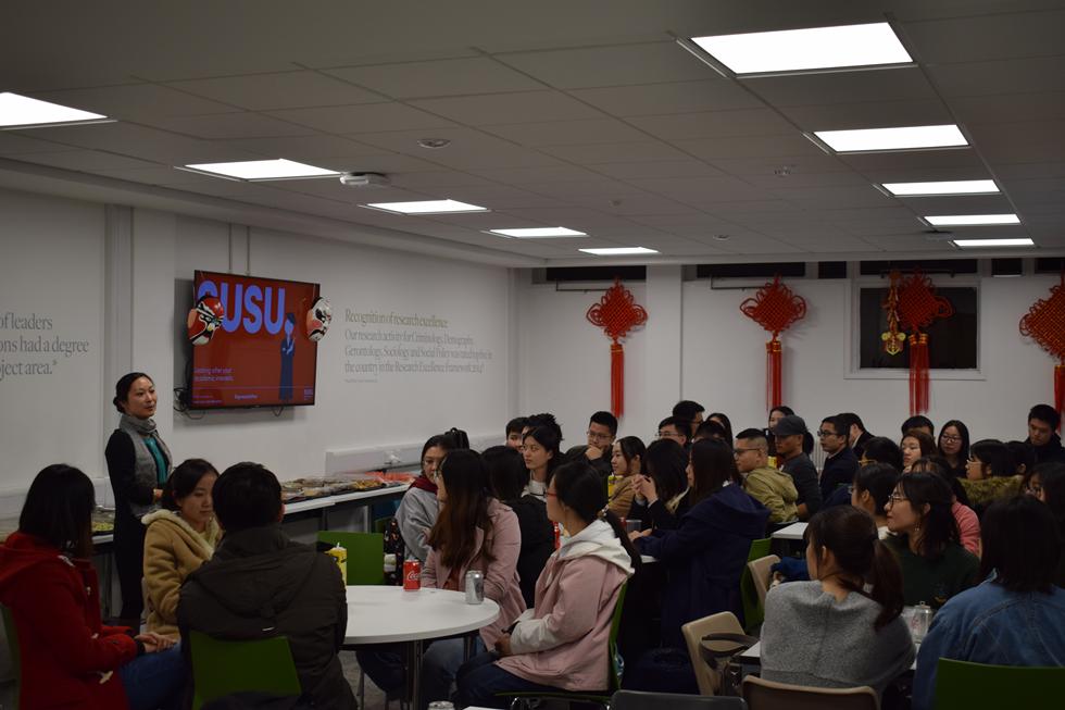 Song Pan Utz giving a welcome talk