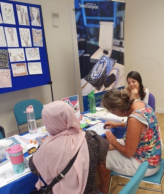 Women working on open day events