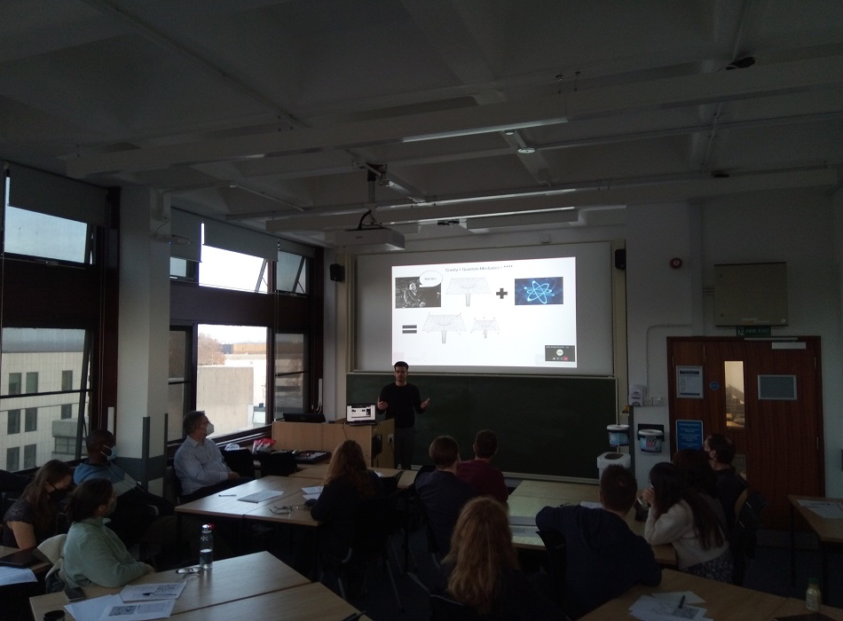 Third year PhD student Davide Bufalini midway through his talk on "Black Holes in String Theory"