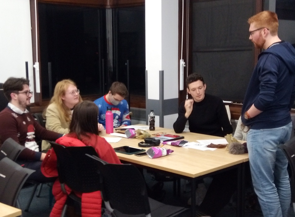 OR PhD student Karl Steinborn-Busse discussing with attendees during an interactive part of his talk on optimisation